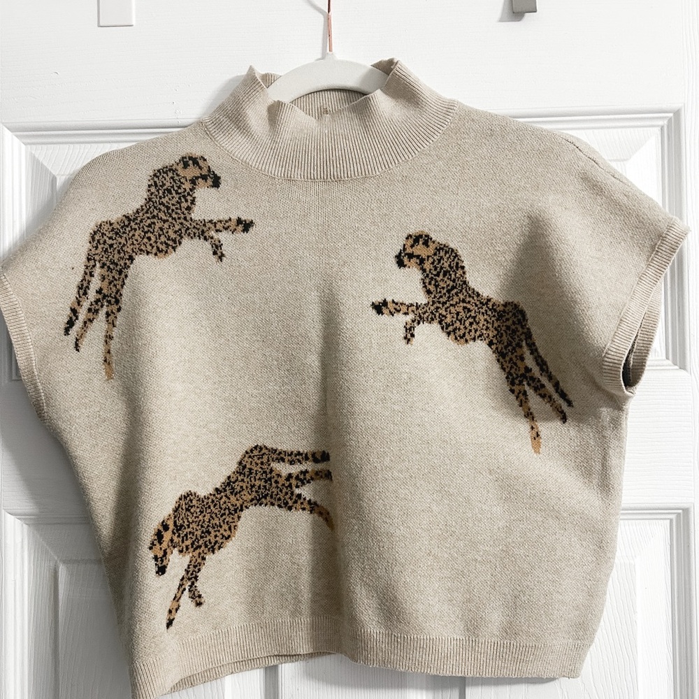 this top from entro. size small with animal print